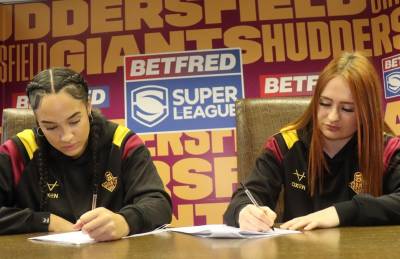 BROWN AND OATES SIGN PROFESSIONAL CONTRACTS