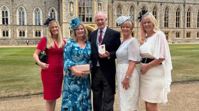 Ken Davy receives Investiture of the OBE 