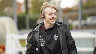 CARROLL PROMOTED TO FIRST TEAM