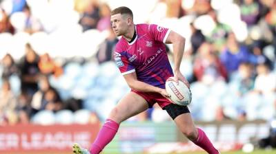 RUSSELL RETURNS HOME