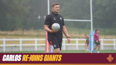 CARLOS RE-JOINS GIANTS!